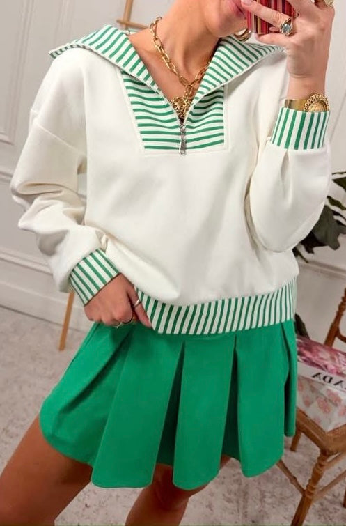 Green pleated skirt