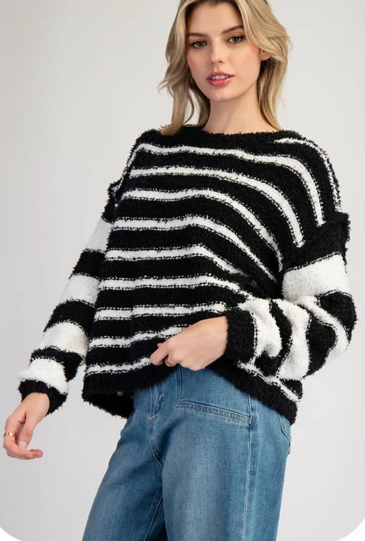 Black and cream fleece sweater