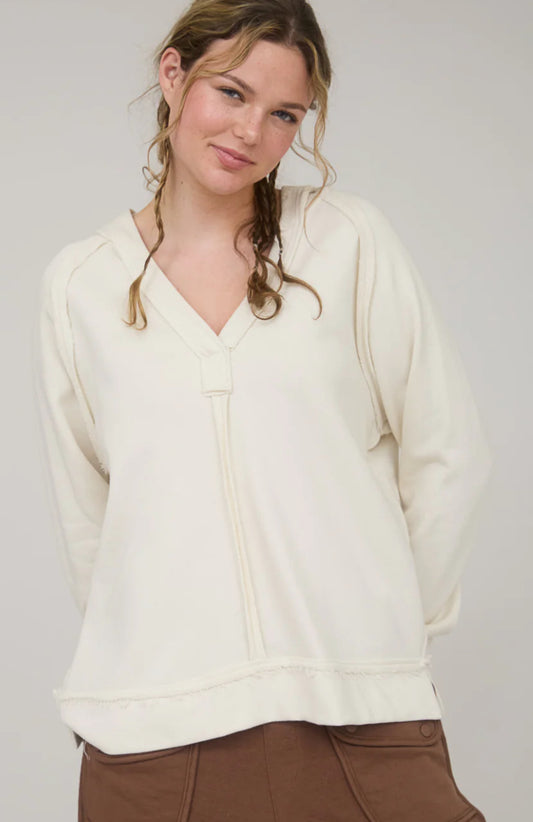 Hooded v neck raw edge knit top